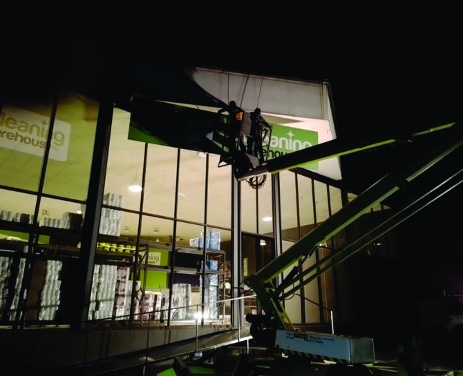 4 Signage Cherry Picker at Night